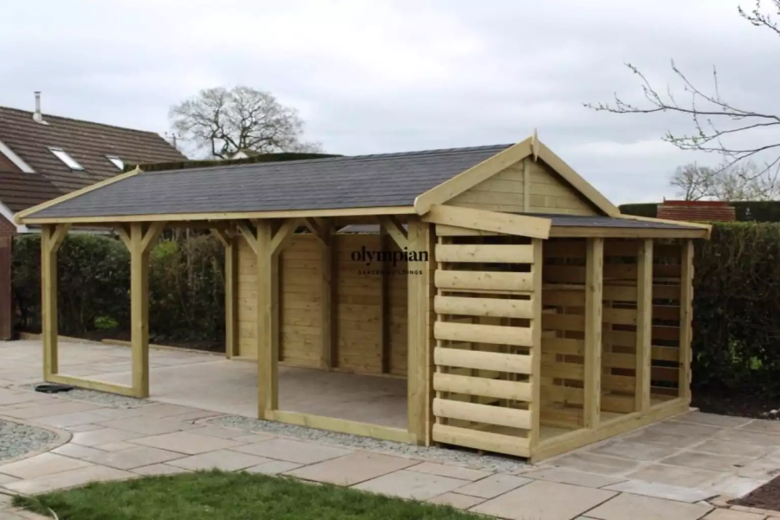 Bespoke building oak frame garage with log store