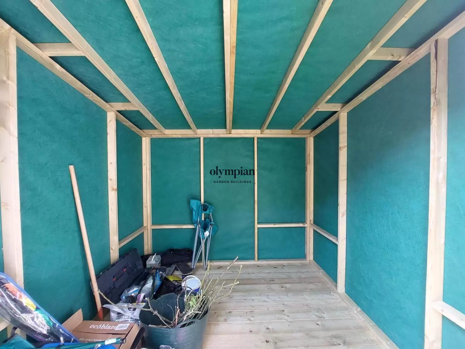 Interior of 8ft x 8ft building with single-sloping roof and internal lining membrane